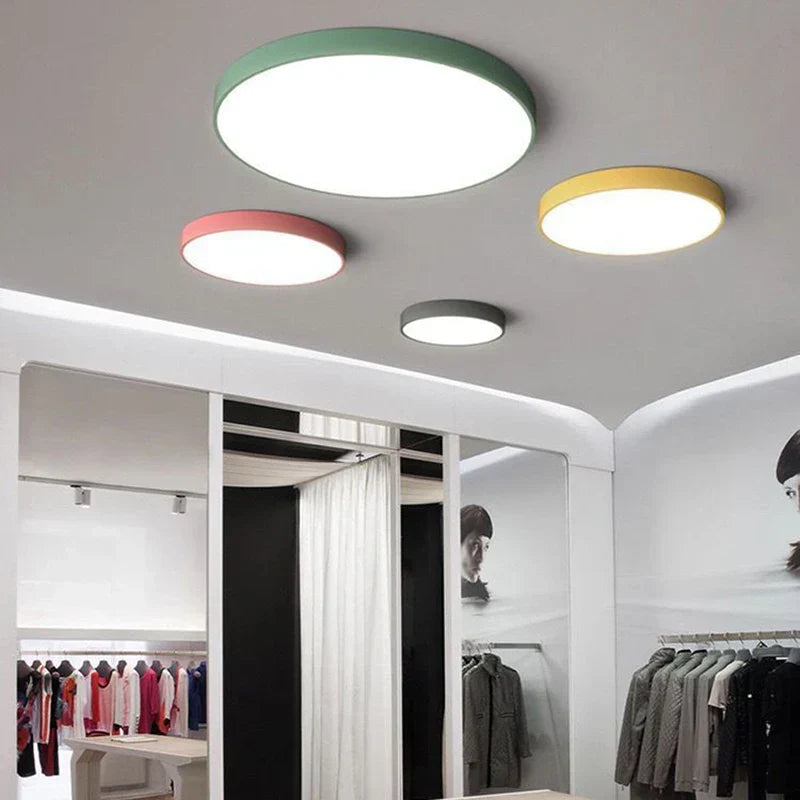 Mira Flush Mount Ceiling Light featuring a minimalist LED design, ideal for modern interiors and energy-efficient lighting solutions. 4