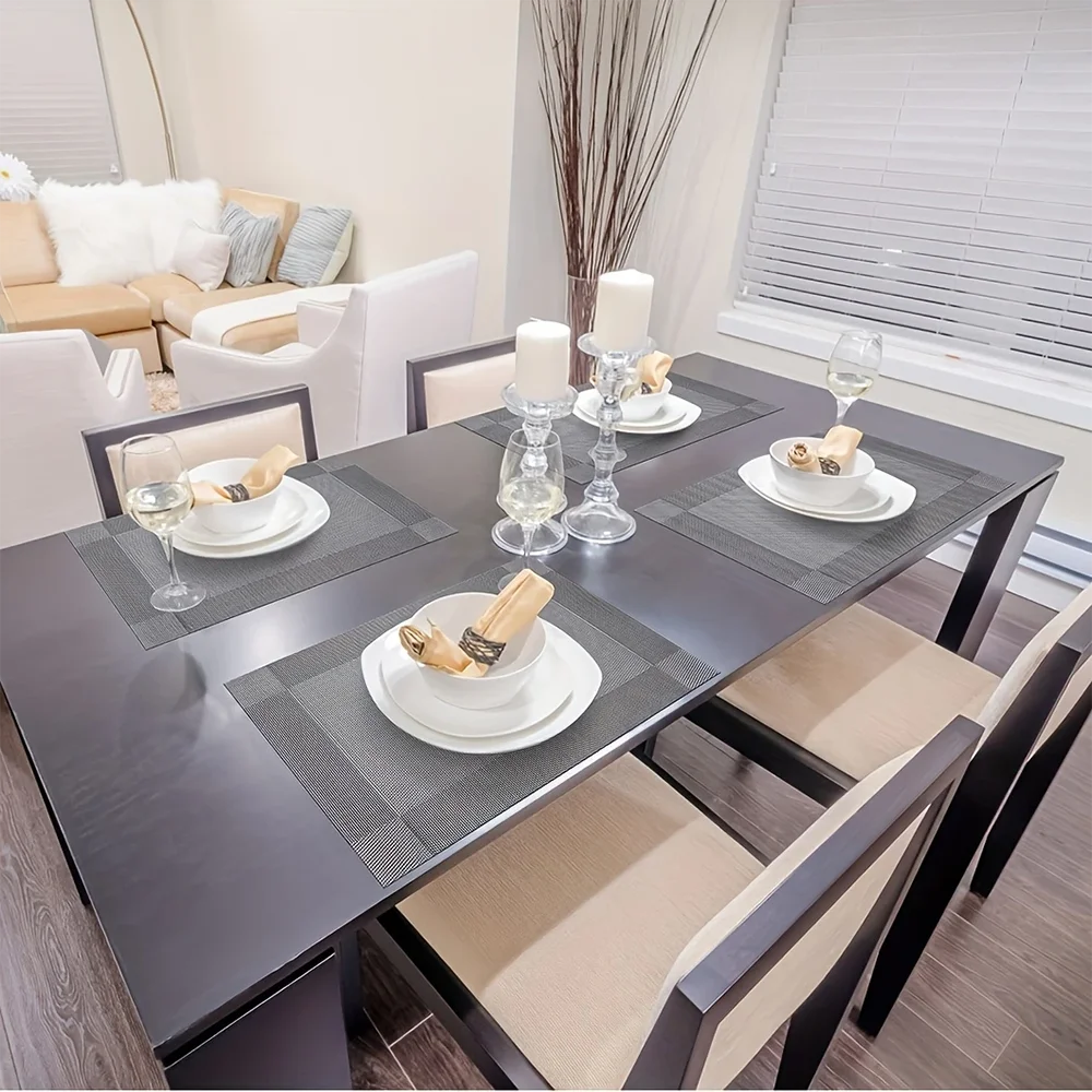 Pura Dining Mat in stylish design, made from heat-resistant PVC, featuring a non-slip surface ideal for protecting dining tables and enhancing table settings. 2