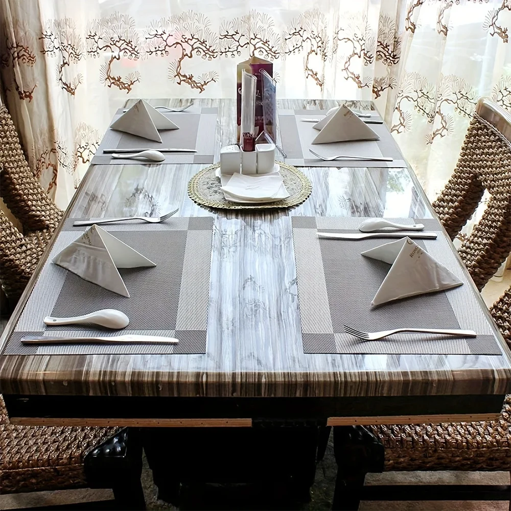 Pura Dining Mat in stylish design, made from heat-resistant PVC, featuring a non-slip surface ideal for protecting dining tables and enhancing table settings. 5